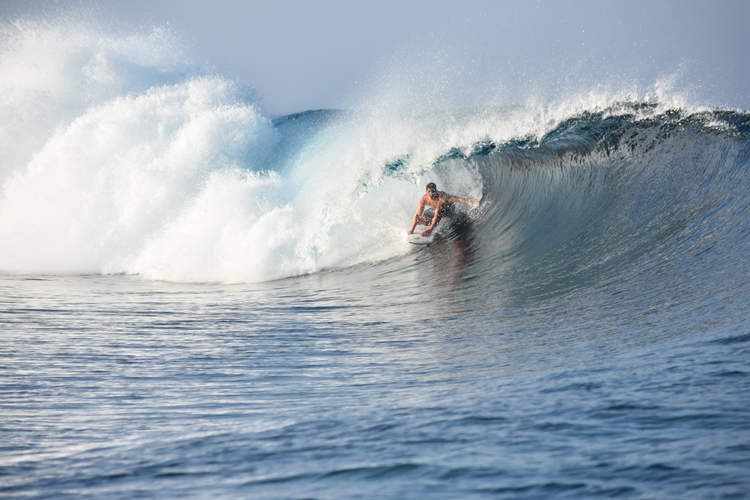 surfing at Matanivusi Surf Resort