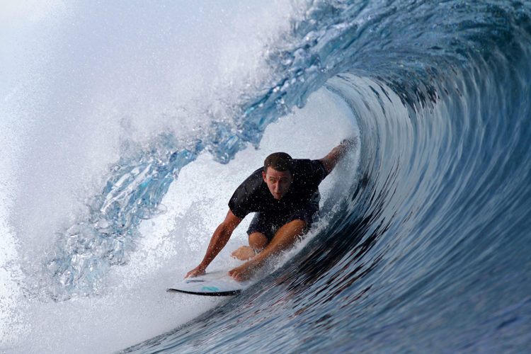 Surfer getting barrelled