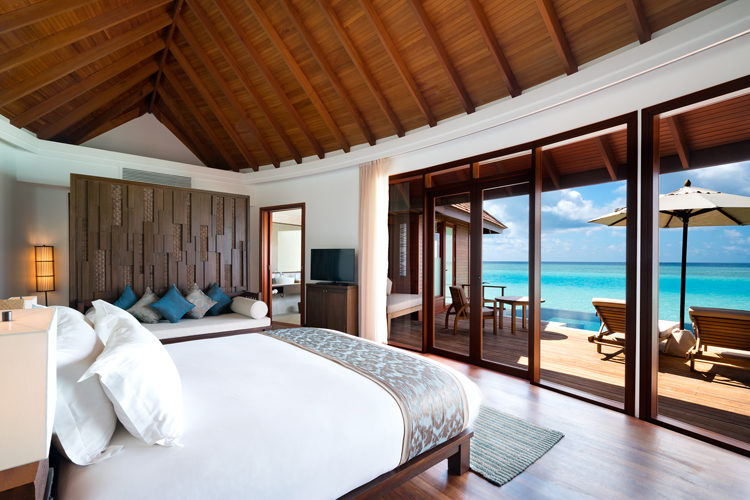 Anantara Dhigu interior of overwater suite with pool