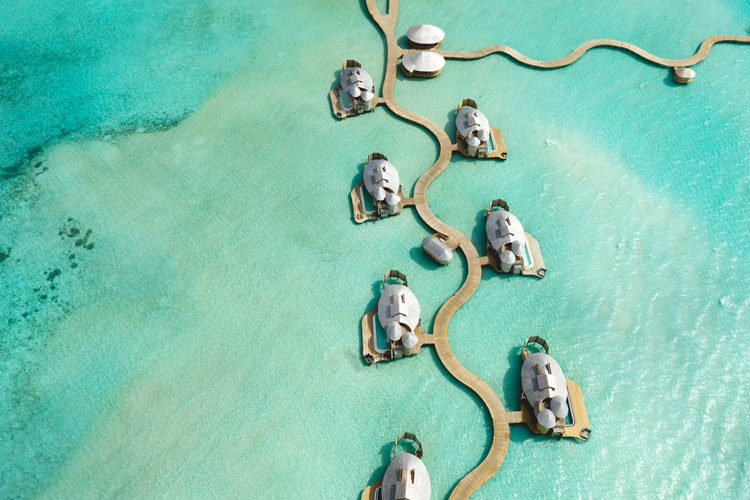 Wayfarers Atlas Luxury Family Surf Resort aerial view of Soneva Jani overwater villas