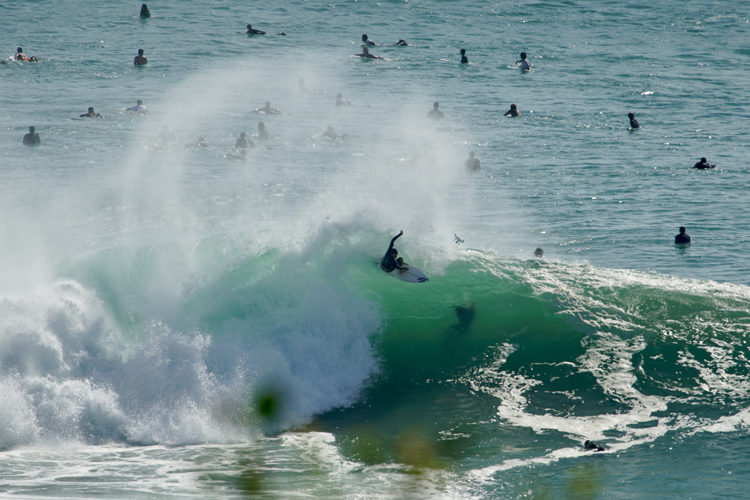 surfing at Suarga Padang Padang