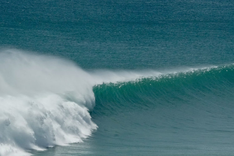 surfing at Suarga Padang Padang